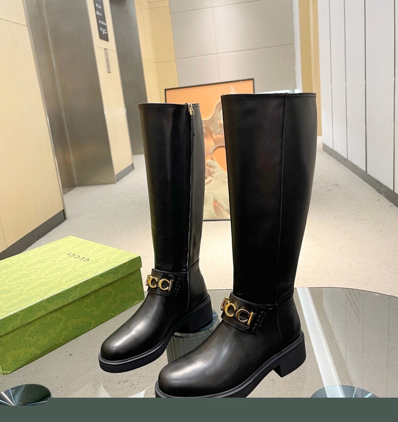 G*u*i boots